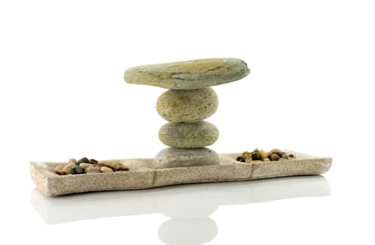 tower stack of stones in perfect balance isolated on white