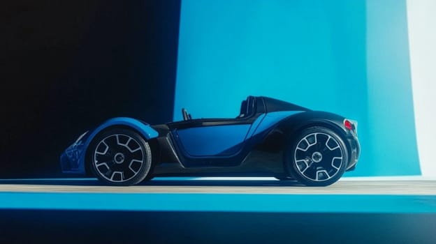 Side view of a modern electric sports car parked in front of a blue wall. Concept of luxury lifestyle and innovative automotive design