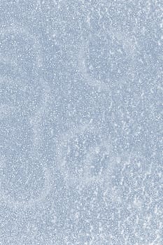 Rough abstract background with specks and spots of blue color