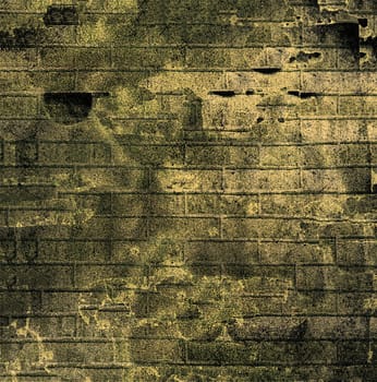 Art grunge textured abstract background of an old brick wall in yellow gray tone