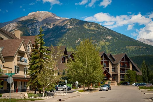 Beautiful picturesque old houses in the Canadian town of Canmore in the mountains. Canmore, Canada - 08.03.2023