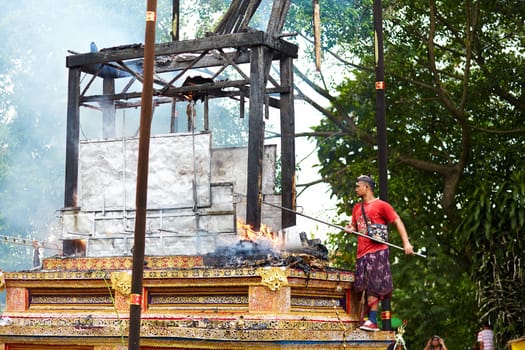 The cremation ceremony for the burning of a bull sculpture in the small town of Ubud on the island of Bali. Bali, Indonesia - 03.02.2018