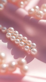 Pearl jewelry on pink satin with soft lighting, elegance and luxury concept.