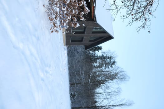 Barnhouse. Wooden secluded house in the Scandinavian and Finland modern style with large windows. Exterior, wooden walls