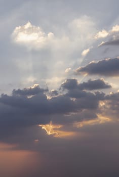 Dramatic clouds and shining form an interesting light pattern against the sky background before sunset. Concept idea of Imaginative clouds nature like a heaven for background wallpaper and Space composition, Nature abstract,
