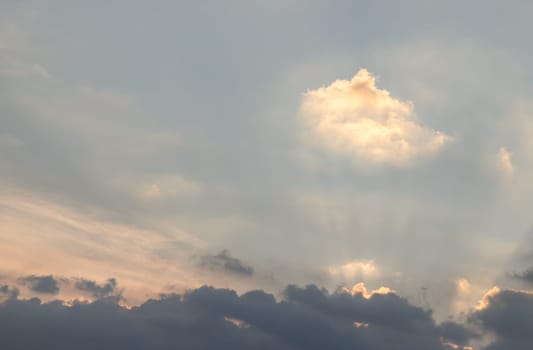Dramatic clouds and shining form an interesting light pattern against the sky background before sunset. Concept idea of Imaginative clouds nature like a heaven for background wallpaper and Space composition, Nature abstract,