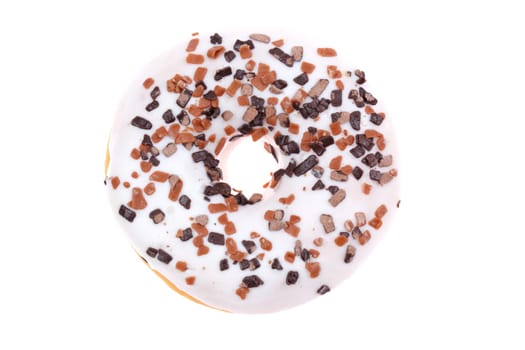 A tempting, delicious donut is topped with smooth white icing and colorful sprinkles, perfect for a sweet treat