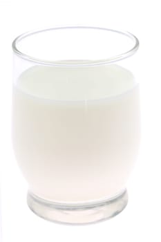 A glass of fresh milk is ideal for beautifully showcasing an array of natural dairy products in your diet