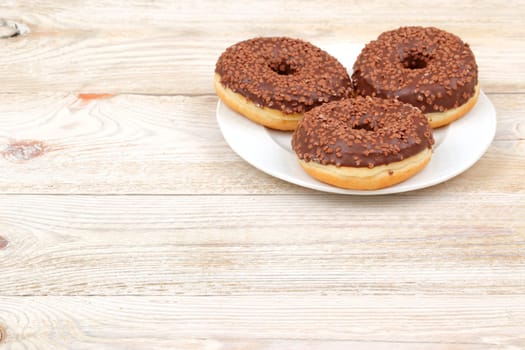 An incredibly tempting and delightful display of chocolatecovered donuts beautifully adorned with colorful sprinkles