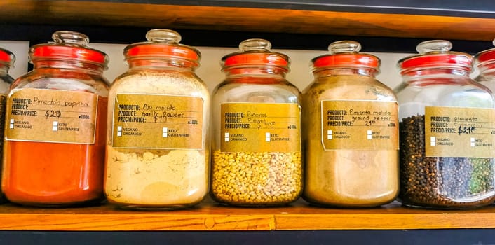 Self service organic store seeds nuts fruit in jars and containers in Zicatela Puerto Escondido Oaxaca Mexico.