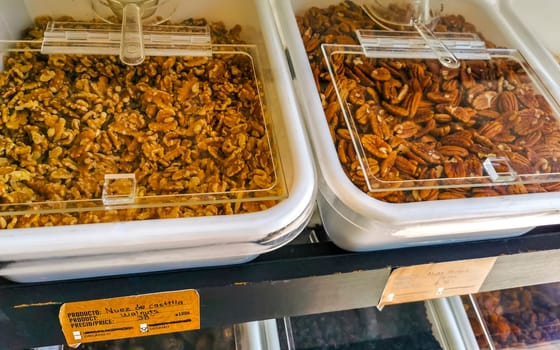 Self service organic store seeds nuts fruit in jars and containers in Zicatela Puerto Escondido Oaxaca Mexico.