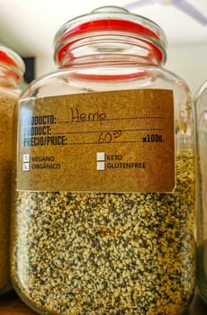 Self service organic store seeds nuts fruit in jars and containers in Zicatela Puerto Escondido Oaxaca Mexico.
