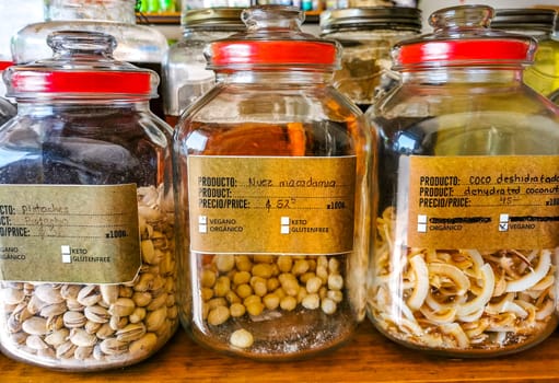 Self service organic store seeds nuts fruit in jars and containers in Zicatela Puerto Escondido Oaxaca Mexico.