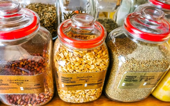 Self service organic store seeds nuts fruit in jars and containers in Zicatela Puerto Escondido Oaxaca Mexico.