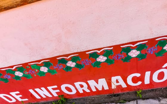 Information board sign in Zicatela Puerto Escondido Oaxaca Mexico.