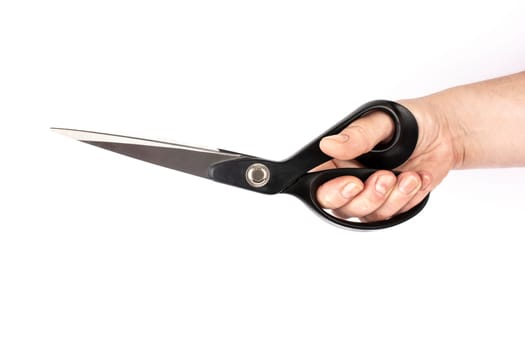 hand with black scissors in white background isolate