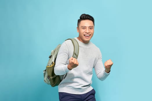 Winner man. Happy guy shows "Yes" gesture. Concept of luck success victory triumph