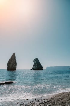 Aerial panoramic view of beautiful sunset above sea. Beautiful seascape. Sun glare, small waves on the water surface. Evening. Horizon. Nobody. No people. Copy space. Never-ending beauty of nature