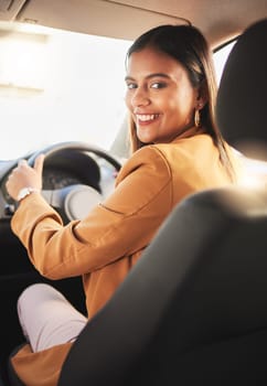 Portrait, driver and business woman in car to travel, journey or rent transportation in city. Happy, driving and person in motor vehicle, automobile or road trip to commute to work in the morning.