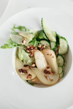 autumn salad with pear and nuts