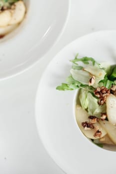 autumn salad with pear and nuts