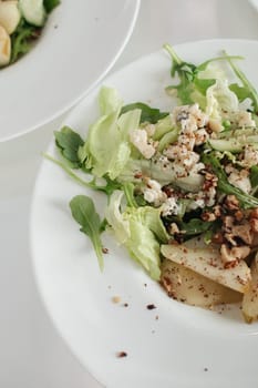 autumn salad with pear and nuts