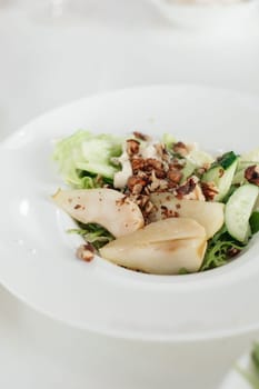 autumn salad with pear and nuts