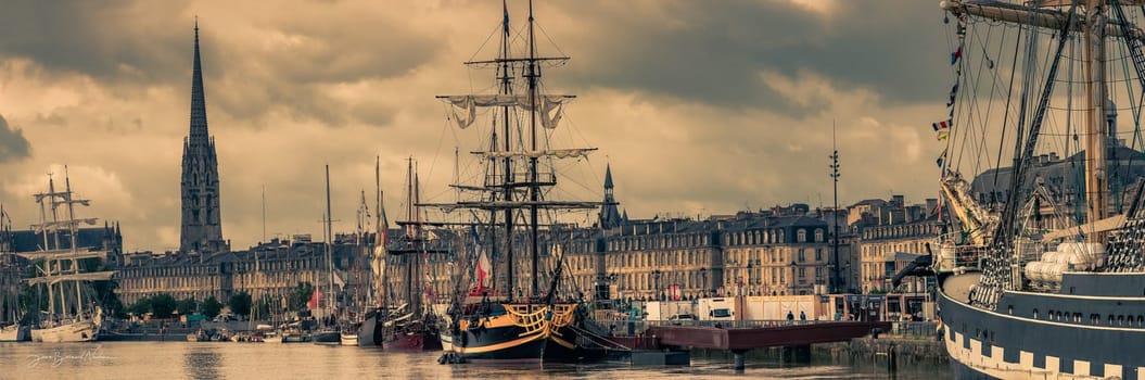 Bordeaux, France, June 2019: Sailboats on the quays of the Garonne river during the Bordeaux fete le fleuve in the city port, High quality photo