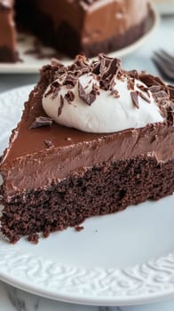 Indulge in a decadent slice of chocolate cake, topped with fluffy whipped cream and rich chocolate shavings, a perfect treat for any occasion