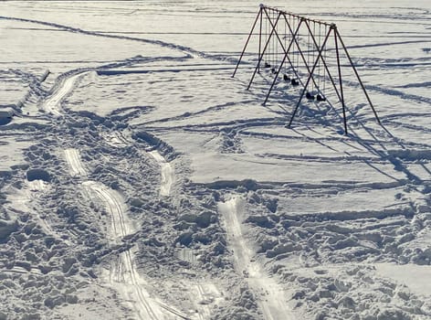 Kids playground in snow on winter season in Canada.