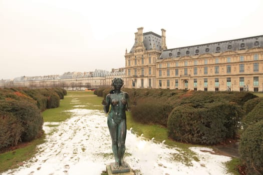 stunning vintage premise stands grandly with its intricate architecture, surrounded by lush greenery under a misty sky, exudes elegance and captures the beauty of timeless architecture, Majestic european castle surrounded by vast greenery and misty sky