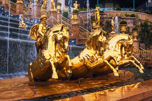 Golden antique statues of horses decorated fountain in Ba Na Hills in Da Nang in Vietnam