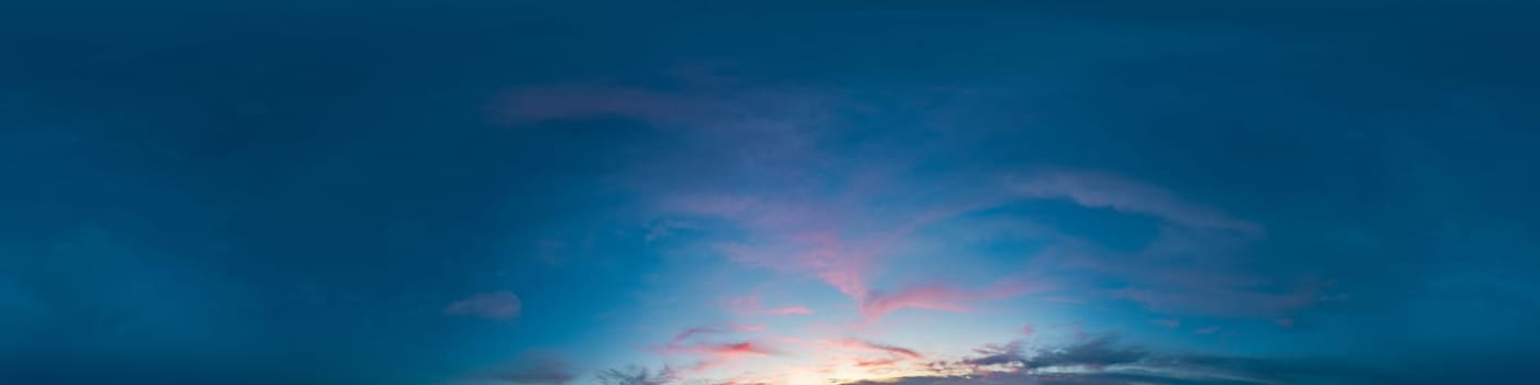 Bright sunset sky panorama with Cirrus clouds. Seamless hdr spherical equirectangular 360 panorama. Sky dome or zenith for 3D visualization, game and sky replacement for aerial drone 360 panoramas.