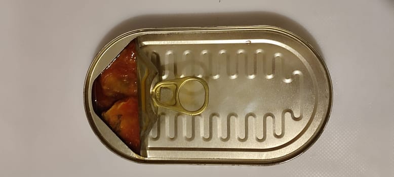 metal can fish in tomato sauce, isolated object, white background. High quality photo