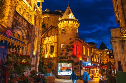 Street of the medieval stone city in Ba Na Hills Park in Da Nang in Vietnam at night