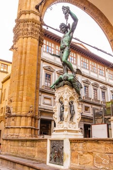 Florence, Italy, January 4, 2024: Sculpture of Perseus with the head of Medusa, work of Benvenuto Cellini, in the loggia dei Lanzi, in the Piazza della Signoria in Florence