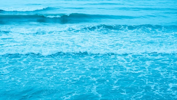 Real photo sea water waves, abstract background, nature power, pale light blue more tone in stock.