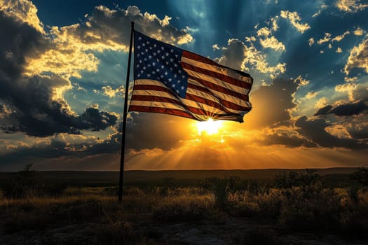 The American flag waving in the wind with a beautiful sunset in the background. Perfect for patriotic or political projects.
