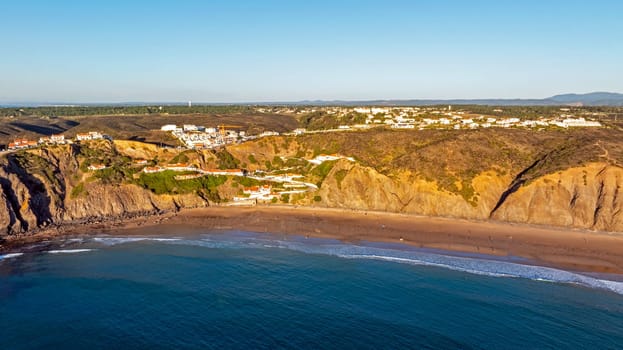 Aerial from the little surfers village Arrifana on the rocks at the westcoast in the Algarve Portugal