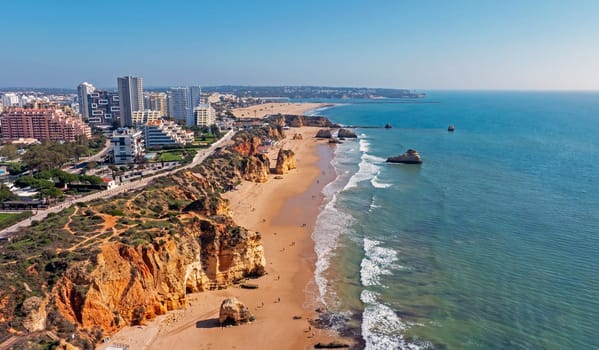 Aerial from Priaia da Rocha near Portimao in the Algarve Portugal
