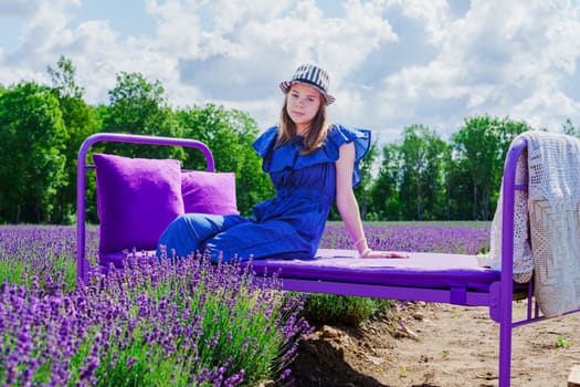 Enchanting Elegance: A Beautiful Girl amidst Lavender Fields. A Dreamy Summer Photo Session in the Lavender Field