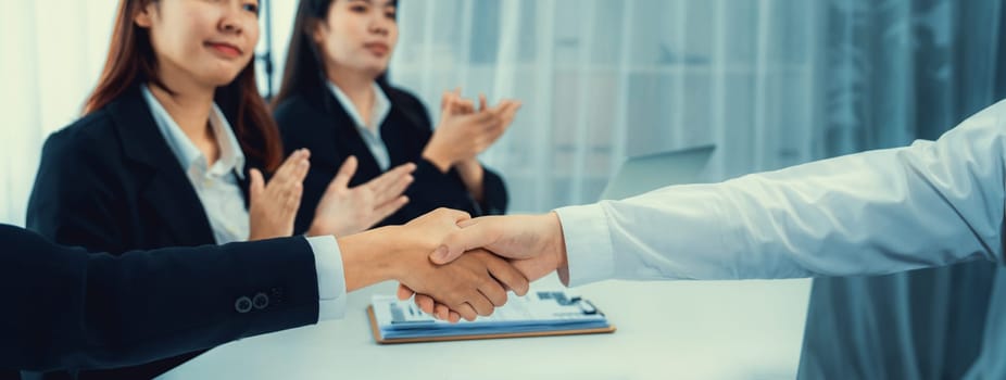 Business people group handshake at meeting table. Job interview success or making successful business oratory agreement