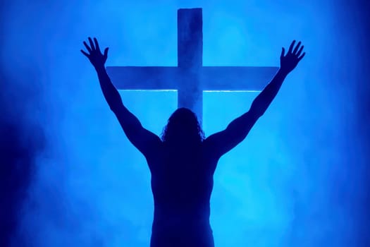 people silhouette with raised hands at christian concert worship God and Jesus Christ, on blue background. Christian concept.
