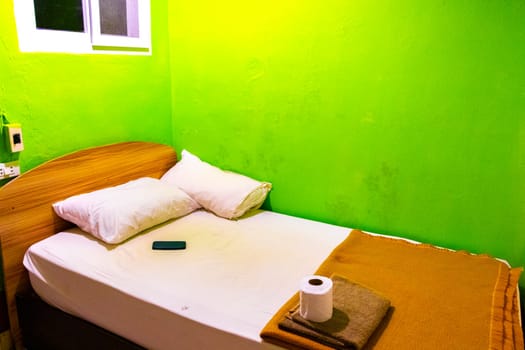 Shabby cheap and dirty hotel room on Koh Phi Phi Don island in Ao Nang Amphoe Mueang Krabi Thailand in Southeast Asia.