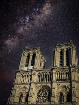 Notre dame cathedral, Paris on a cloudy evening under a starry sky, High quality photo