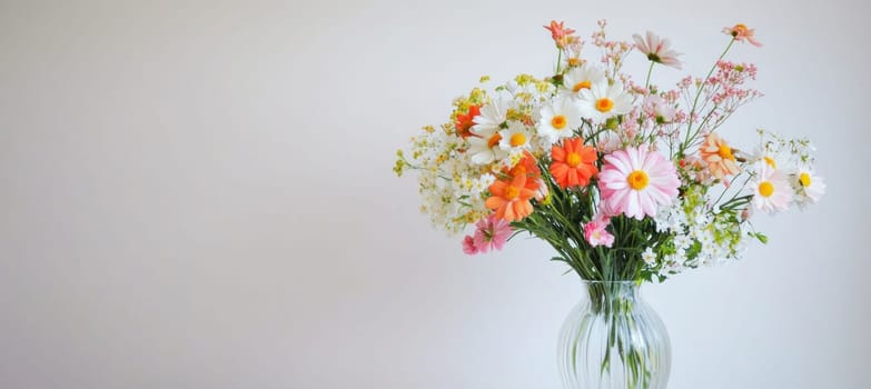 Lush bouquet of fresh cut flowers including roses, matthiola and eucalyptus, creating a spring atmosphere