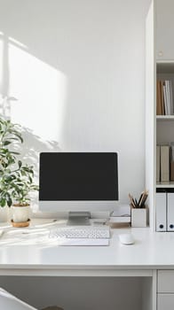 Bright home office with computer, keyboard, mouse, plant, and shelves in background, creating a productive and inspiring workspace