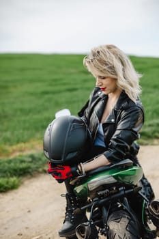 Woman Holding Black Helmet in Leather Jacket. Woman in a black leather jacket holding a black helmet, exuding a confident and stylish look. Perfect for themes of adventure, freedom, and modern style