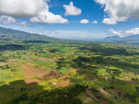 Aerial drone of farmland in a valley in a mountainous province. Negros, Philippines