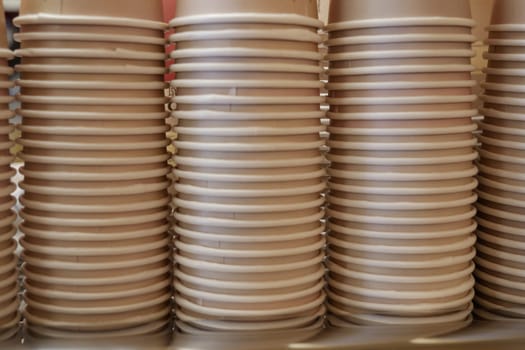 Lots of paper coffee cups at cafe ,